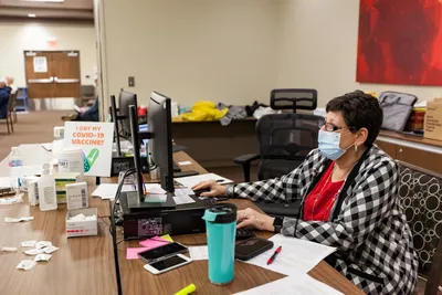 2021.03.15 MedCenter Health vaccine clinic volunteers 0079